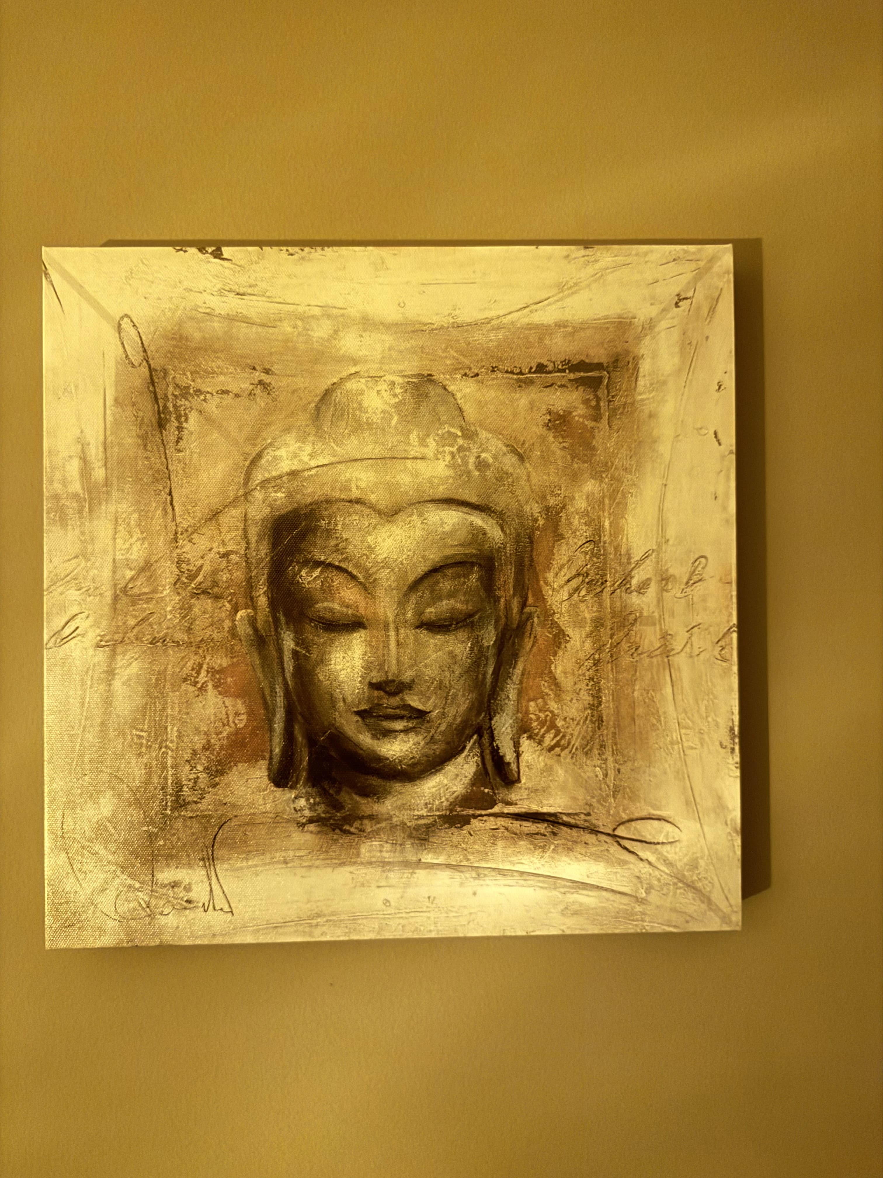 Picture of Buddha in a yellow background